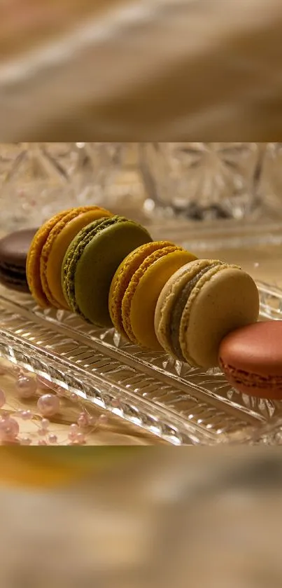 Colorful macarons on a decorative tray with soft blurred background.