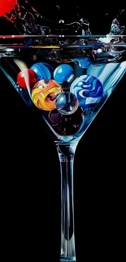 A martini glass filled with colorful marbles splashing inside.