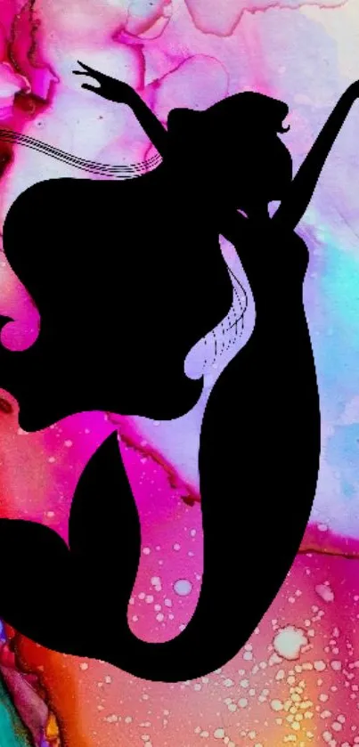 Silhouette of a mermaid against a colorful watercolor backdrop with magenta highlights.