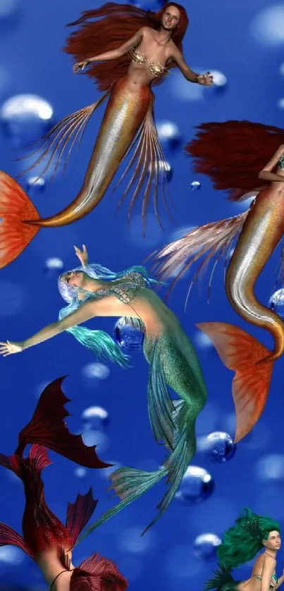 Four vibrant mermaids swim on a deep blue background with bubbles.