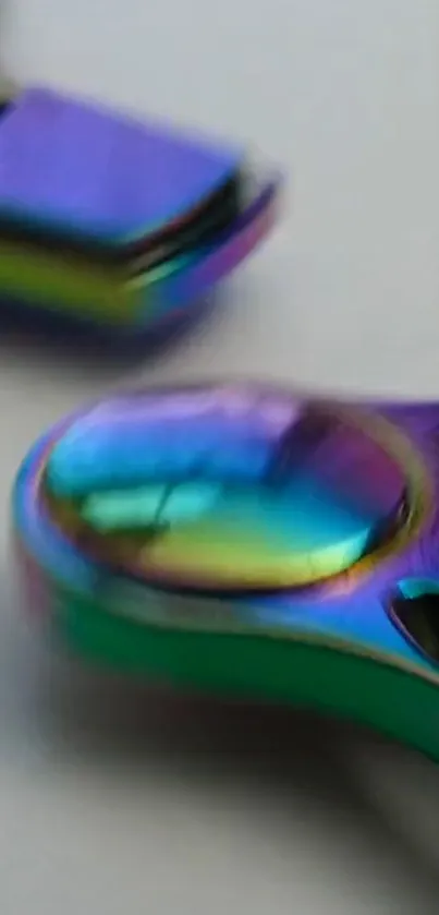 Colorful metallic fidget spinner with iridescent hues.