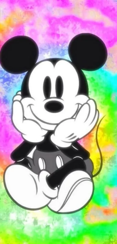 Colorful Mickey Mouse on vibrant rainbow background wallpaper.