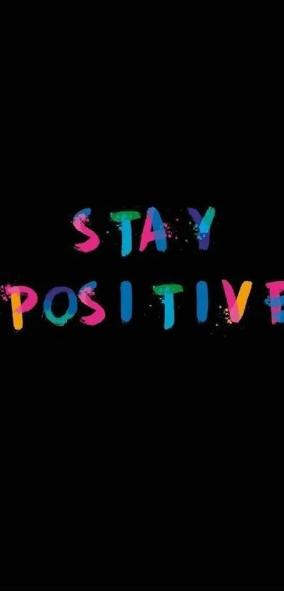 Colorful 'Stay Positive' text on black background wallpaper.