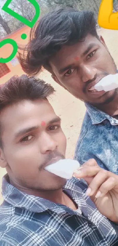 Two friends enjoying ice cream outdoors with colorful graphics.