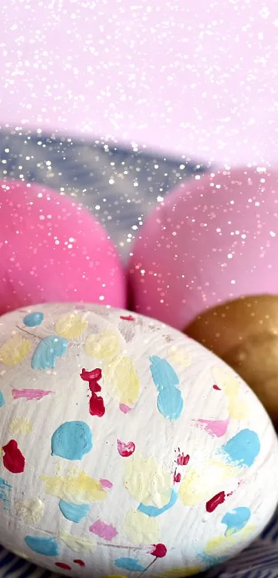 Vibrant painted Easter eggs in pink, gold, and pastels on a patterned plate.