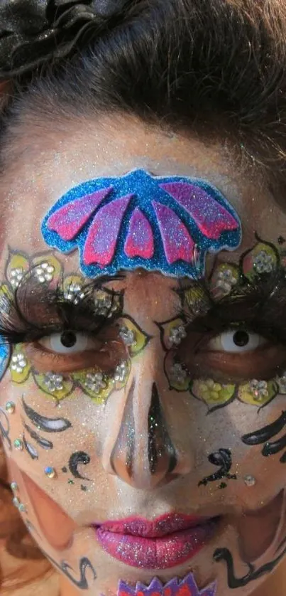 Close-up of a face with colorful and intricate painted designs.