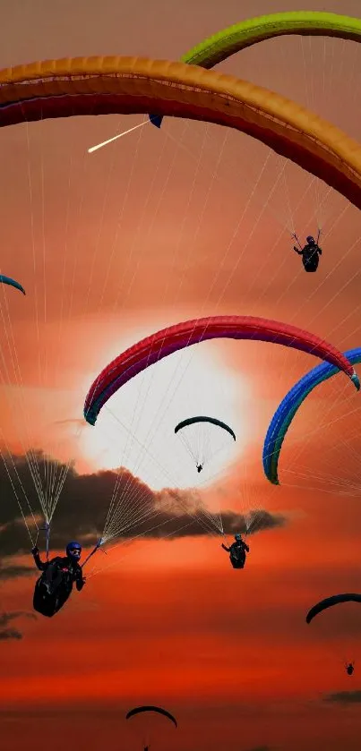 Colorful paragliders soaring in a vibrant sunset sky.