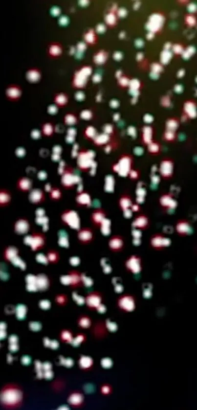 Vibrant mobile wallpaper with colorful particles on a dark background.