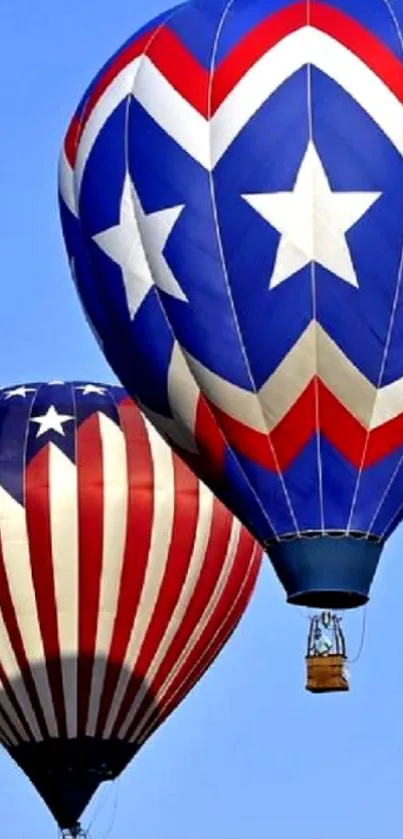 Colorful hot air balloons with patriotic designs in a clear blue sky.