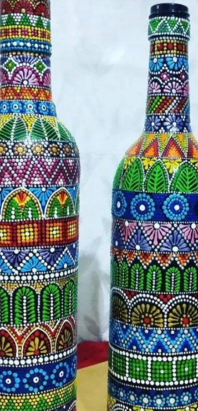 Colorful bottles with intricate patterns on a light background.