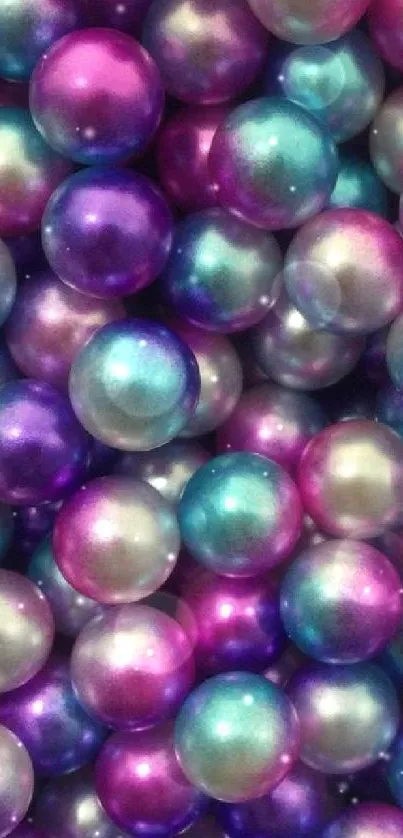 Colorful pearl balls in pink, blue, and purple hues.