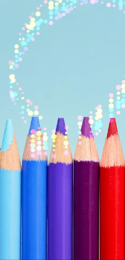 Colorful pencils against a soft blue background for mobile wallpaper.