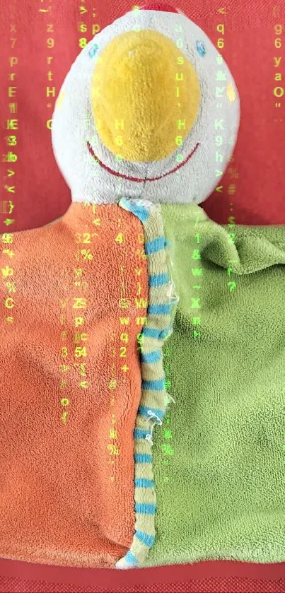 Colorful plush toy with a digital matrix on a red background.