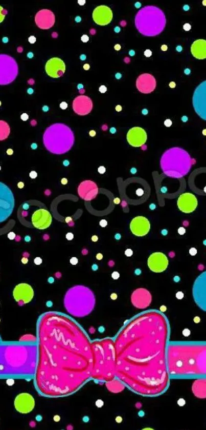 Colorful polka dot wallpaper with pink bow on black background.