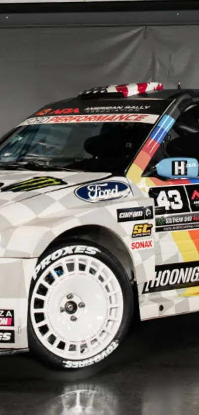 Vibrant rally car with bold multi-color design on white backdrop.