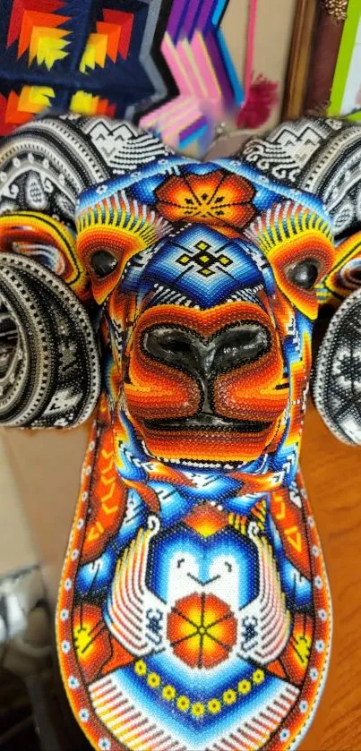 Colorful beaded ram head design with vibrant patterns.