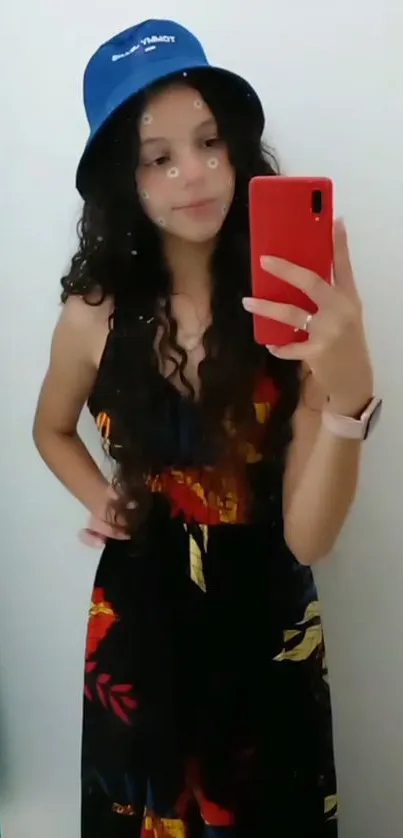 Stylish girl takes a mirror selfie in vibrant attire.