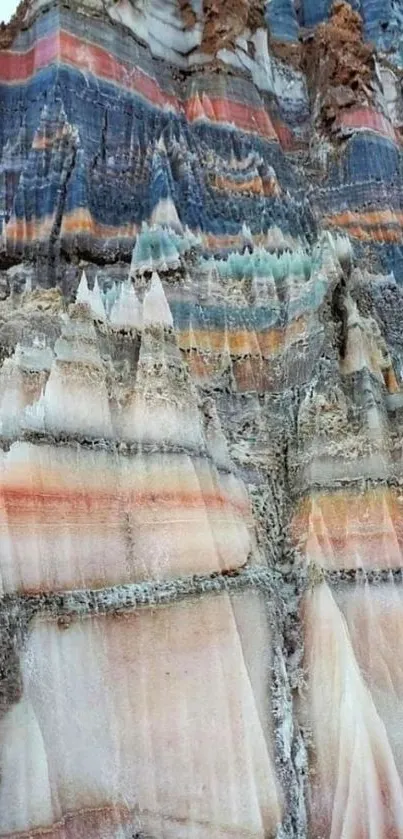 Colorful layered rock formation wallpaper with natural textures.