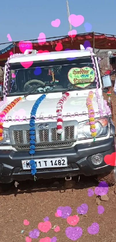 Decorated vehicle with people in traditional attire under a blue sky.