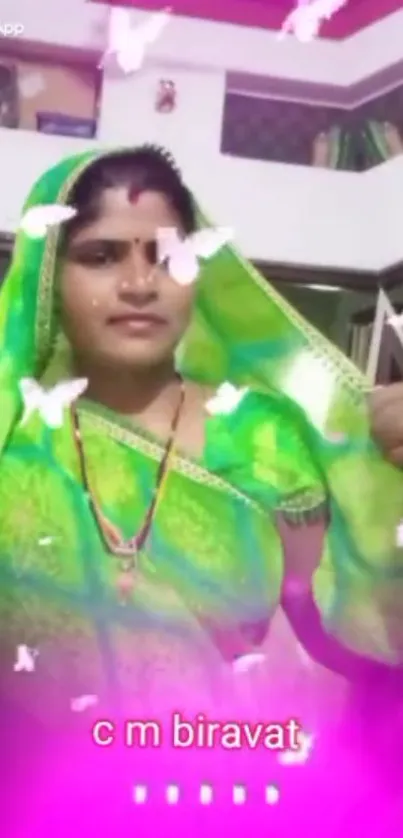 Woman in a green saree with butterfly animation.