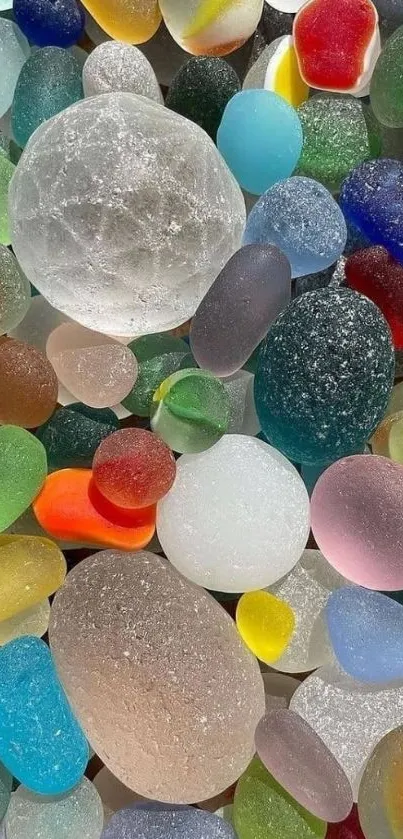 Colorful sea glass stones on a mobile wallpaper.