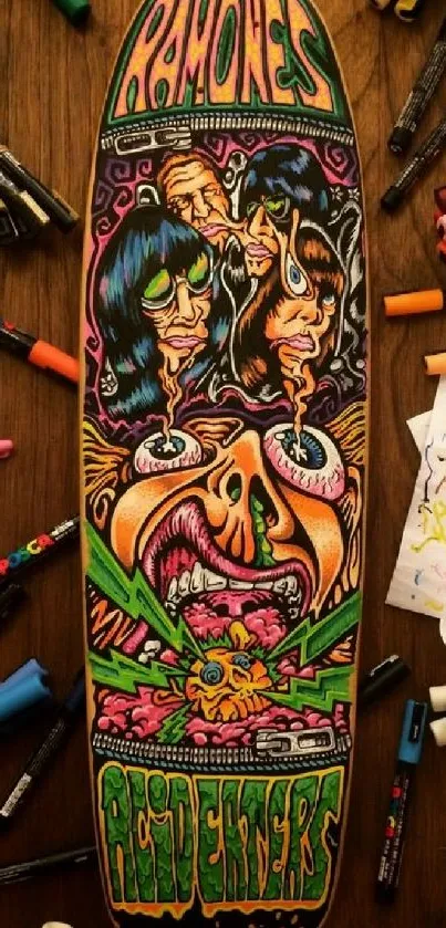 Colorful skateboard deck art amidst markers on a table.