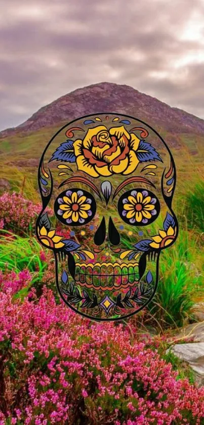 Vibrant sugar skull on scenic mountain landscape wallpaper.