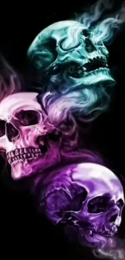 Vibrant skull wallpaper with pink, purple, cyan smoke on black background.