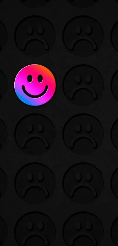 Colorful smiley face among black sad faces wallpaper.