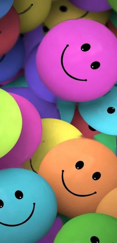 Colorful smiley face balls in vibrant hues for a happy phone wallpaper.