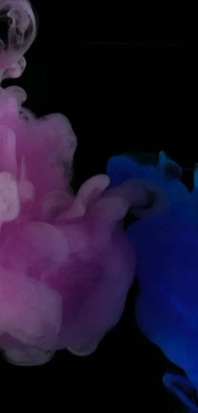 Pink and blue smoke art wallpaper on a black background.