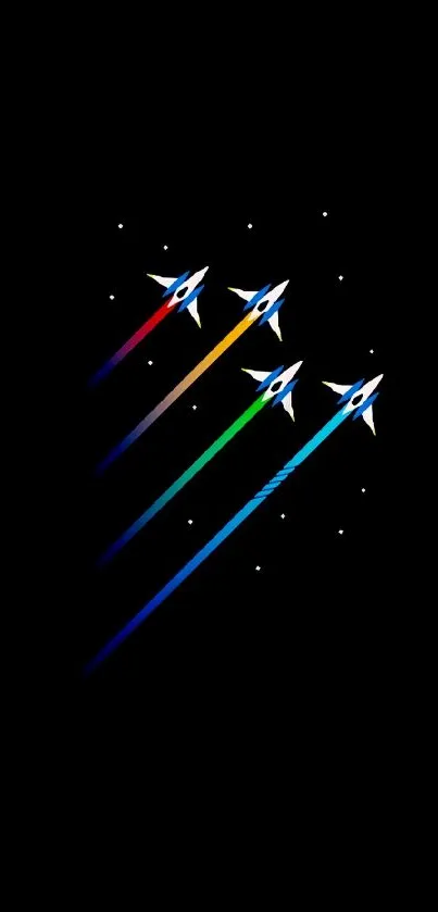 Four colorful spaceships with vibrant trails against black space.