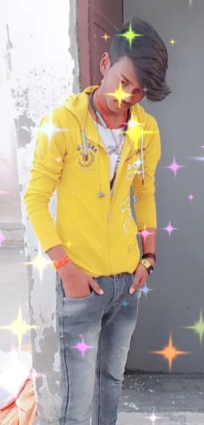 Young person in yellow hoodie with colorful sparkles on a vibrant background.