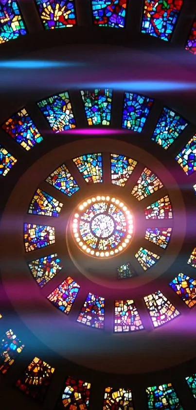 A spiral of colorful stained glass radiates light and color in this stunning artwork.