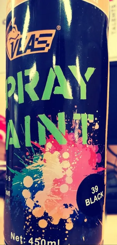 Colorful spray paint can with vibrant splashes.