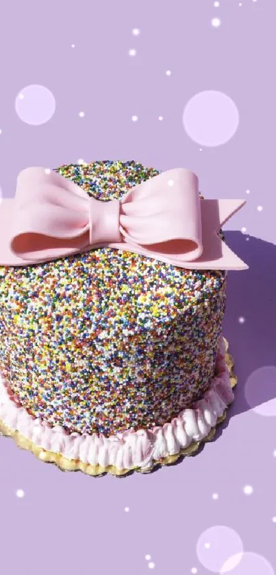 Colorful cake with sprinkles and a pink bow on lavender background.