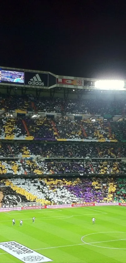 Vibrant football stadium with colorful crowd and bright lights.