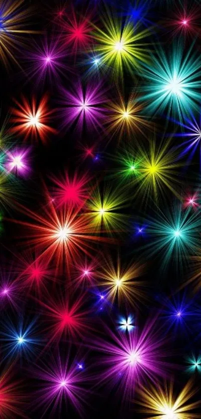 Vibrant starburst wallpaper with colorful light explosions on a dark background.