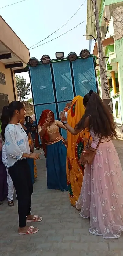 Group enjoying a colorful street celebration in traditional attire.