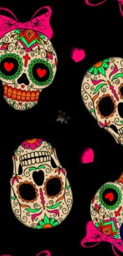 Colorful sugar skulls on a black background wallpaper.