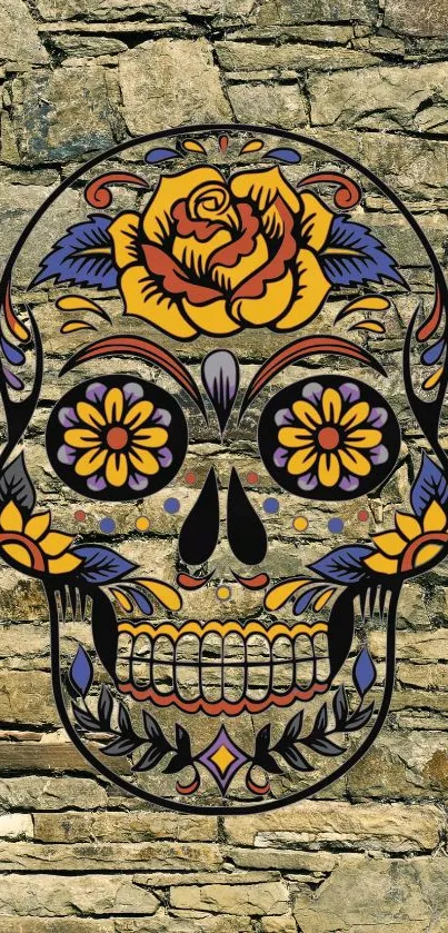 Colorful skull with floral designs on stone background.