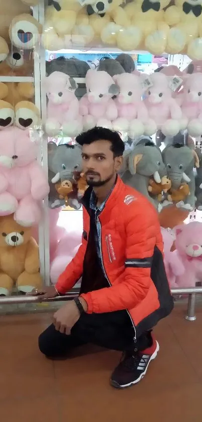 Man in orange jacket with colorful teddy bears