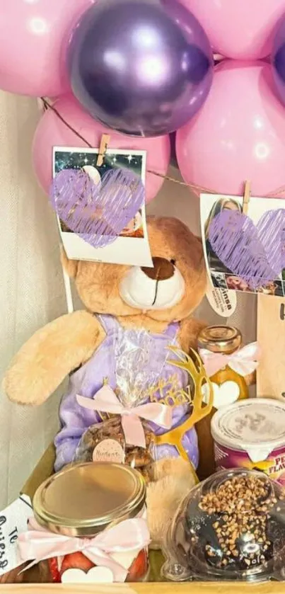 Festive mobile wallpaper with teddy bear, gifts, and colorful balloons.