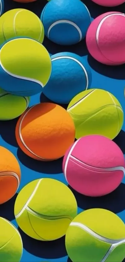 Colorful tennis balls on a blue background.