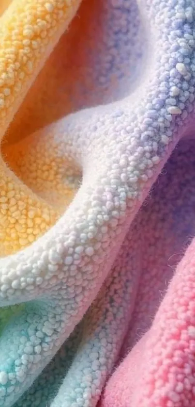 Colorful textured fabric with soft pastel hues, perfect as a mobile wallpaper.