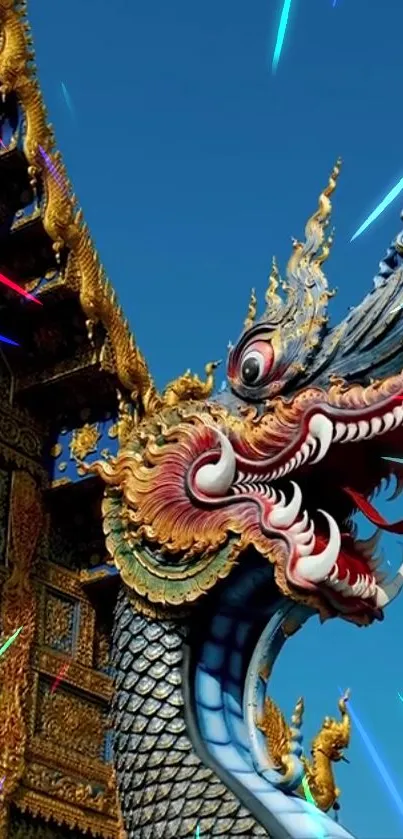 Intricate Thai dragon against blue sky, vibrant colors.