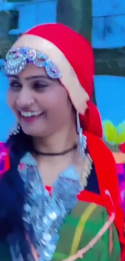 Woman in colorful traditional attire with a snowy background.