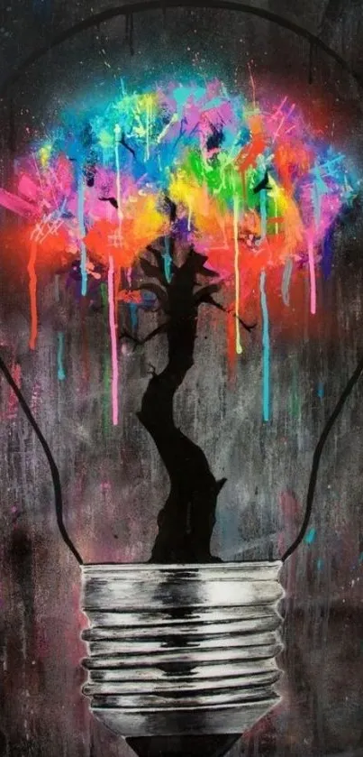 Vibrant tree art within a lightbulb on a black background.