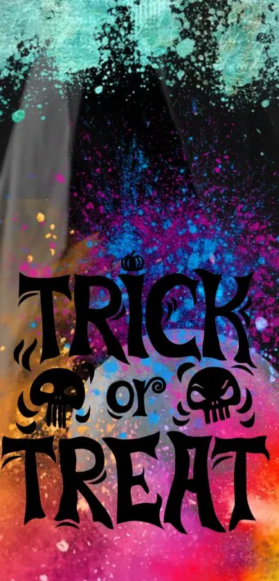 Colorful Halloween 'Trick or Treat' wallpaper with vibrant splashes and skulls.