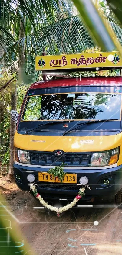 Vibrant yellow and red truck amidst green palms.